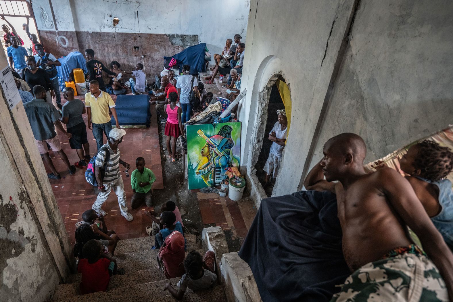 Displaced Haitians take shelter at the Rex Medina theater in downtown Port-au-Prince. The former theater was closed after the country's devastating earthquake in 2010, but it was reopened in August by a group of local residents seeking safety from gangs.