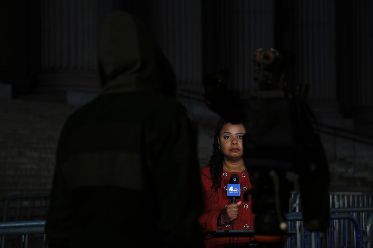 A media member prepares outside the court on Tuesday.