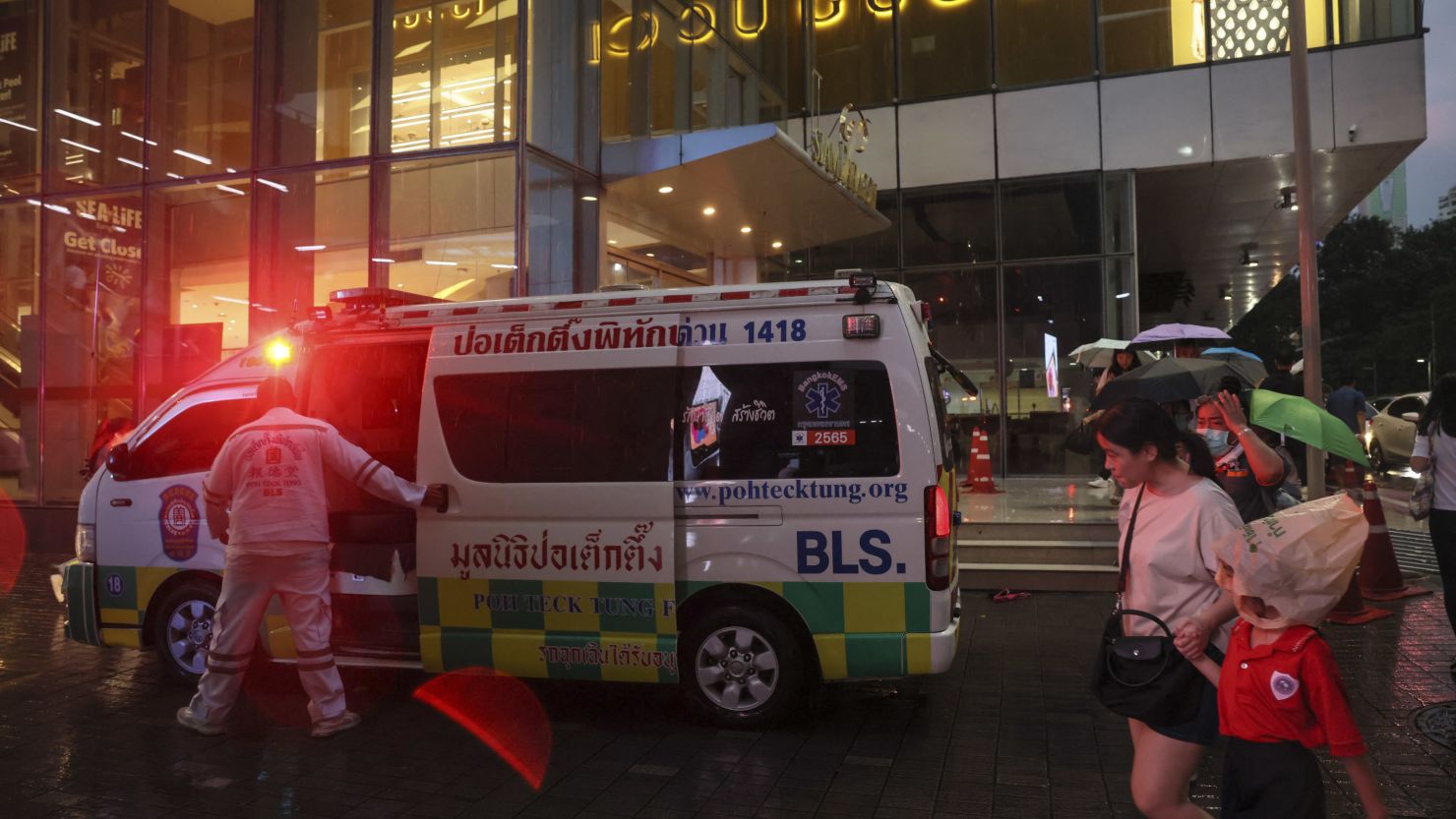Emergency services arrive after a deadly shooting at a shopping mall in central Bangkok, Thailand, on October 3.