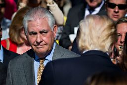 Then-Secretary of State Rex Tillerson looks at then-President Donald Trump during a ceremony to commemorate the September 11, 2001, terrorist attacks at the Pentagon on September 11, 2017.