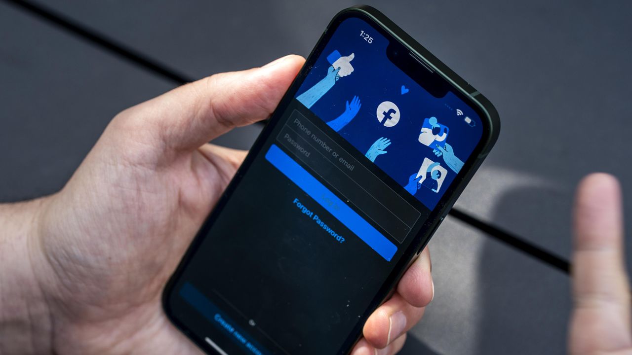 Facebook viewed on an iPhone SE in San Francisco, California in March 2022.