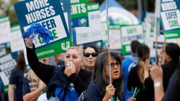 FILE PHOTO: Registered nurses at Kaiser Permanente San Diego conduct an early morning one-day informational picket outside one of the company's three medi