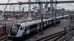 LONDON, ENGLAND - OCTOBER 03: A train to Sheffield runs past as construction continues on the Old Oak Common HS2 site on October 03, 2023 in London, England. Speculation about the fate of the HS2 high-speed rail project reached a fever pitch this week amid rumours that the government would shelve the Birmingham-to-Manchester leg and also could announce that the line will no longer end at Euston, at least initially, instead terminating at Old Oak Common. The new station here is scheduled to be completed around the end of the decade. (Photo by Dan Kitwood/Getty Images)