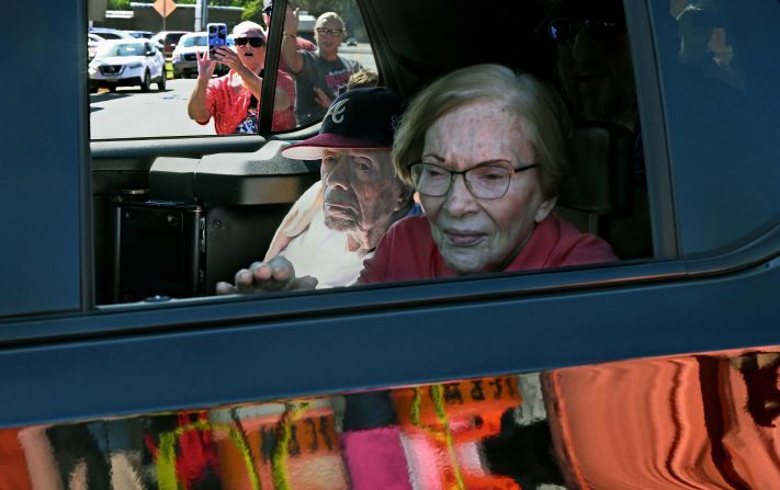 The Carters <a  target="_blank">appear at the Peanut Festival Parade</a> in Plains in September 2023. It was the first time the former president had been seen in public since he began receiving hospice care at home in February.