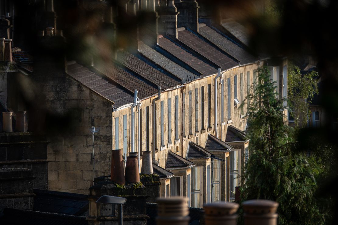 Early morning sun illuminates streets of residential terraced houses, on September 17, 2023 in Bath, England. Soaring interest rates and falling prices has meant the end of the UK's 13-year housing market boom potentially leading to a wider house price crash.