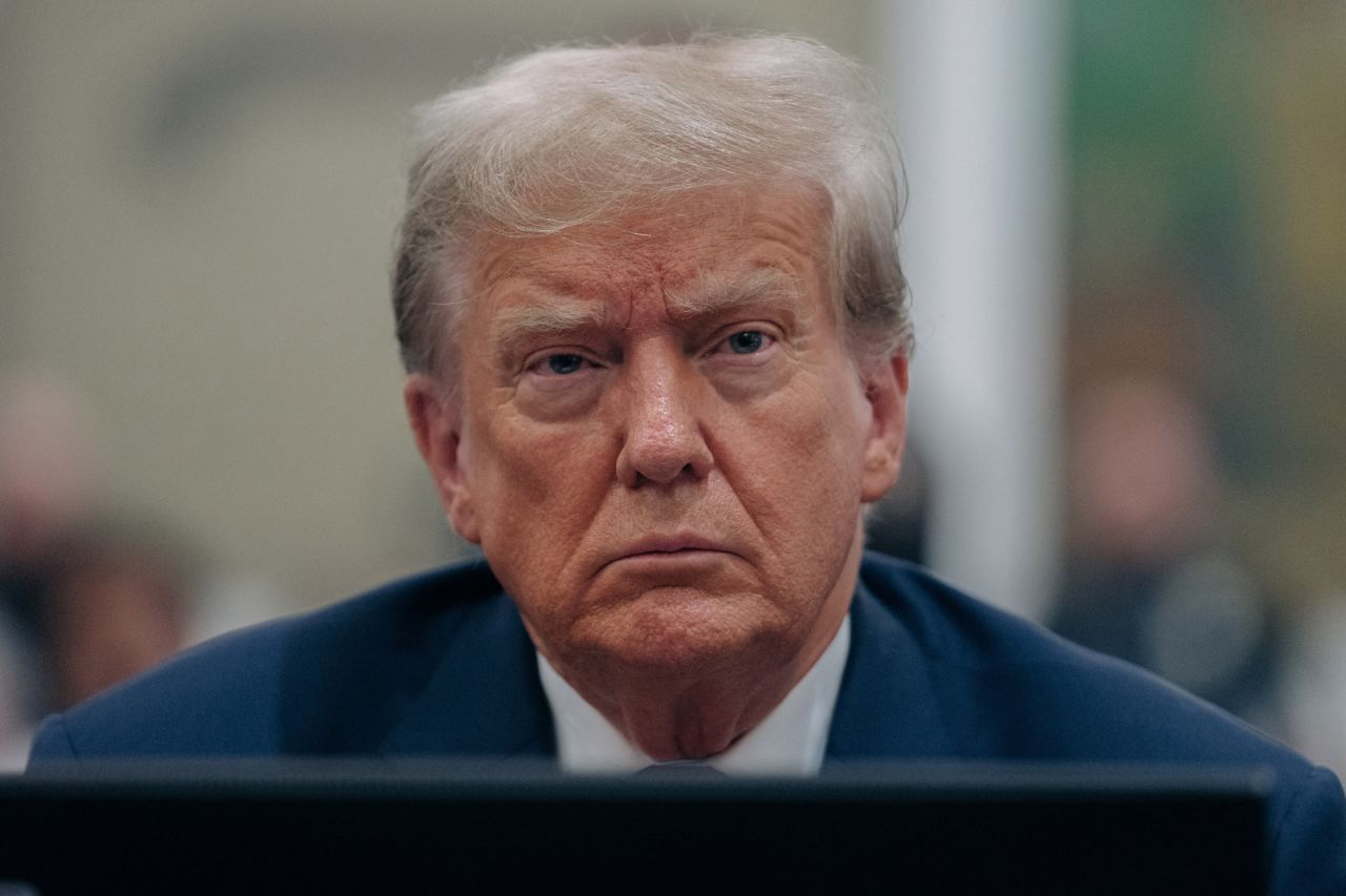 Former President Donald Trump listens during a civil fraud trial in New York on Wednesday, October 4.