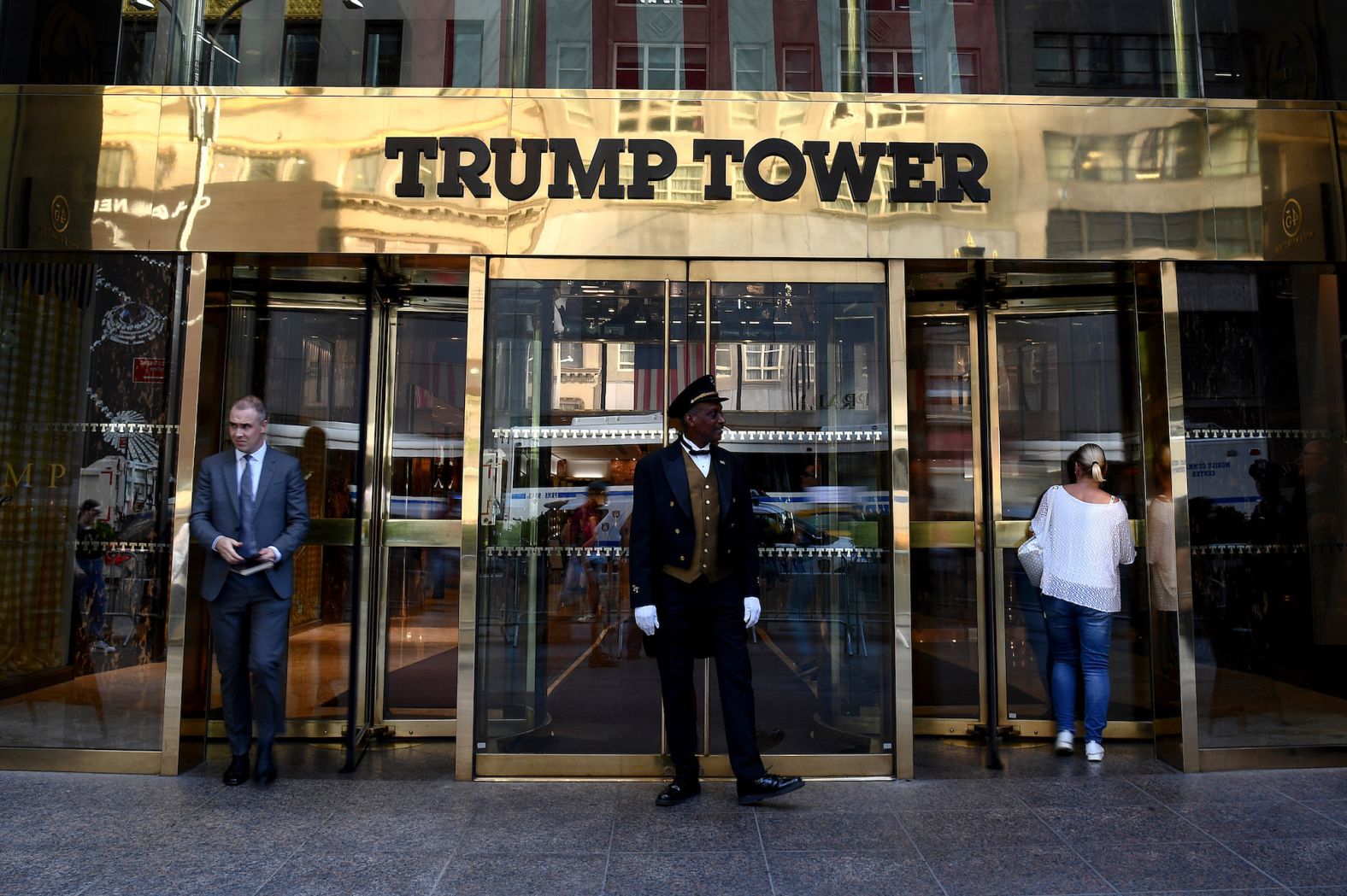 A guard stands at the entrance of New York's Trump Tower on October 3, the second day of the trial.