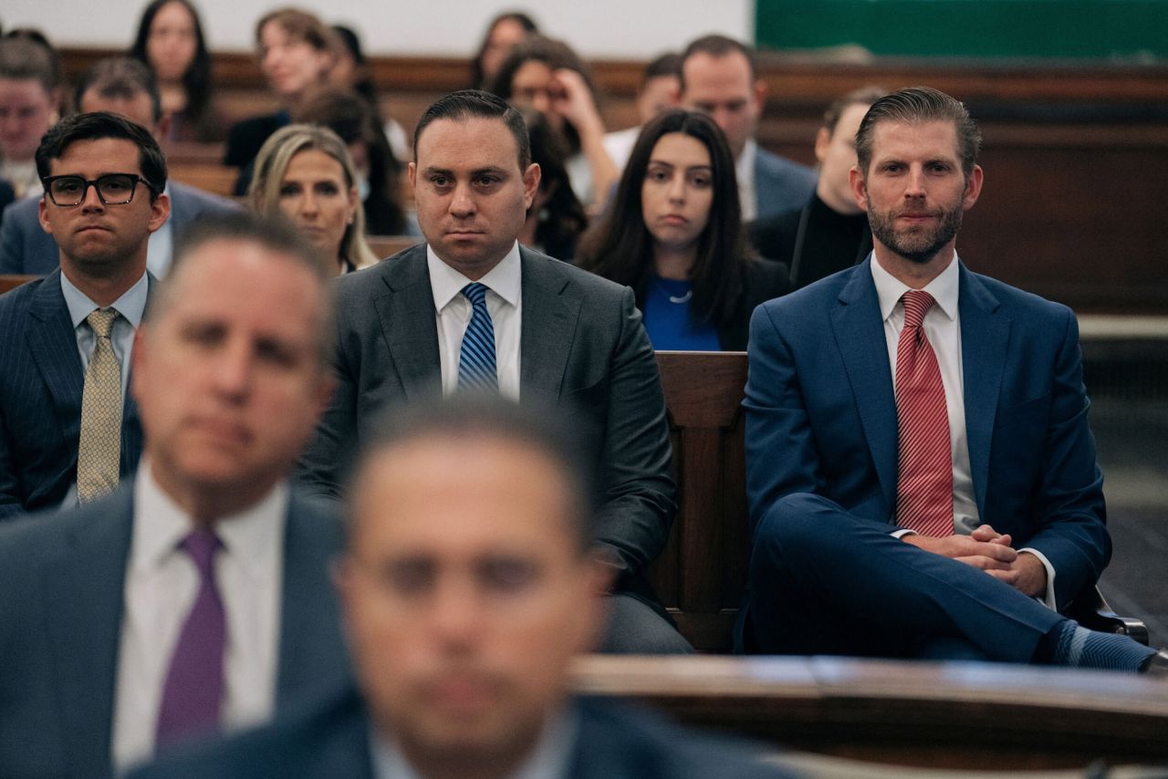 Trump's son Eric, right, attends the proceedings on Wednesday. He is also a defendant in the case.