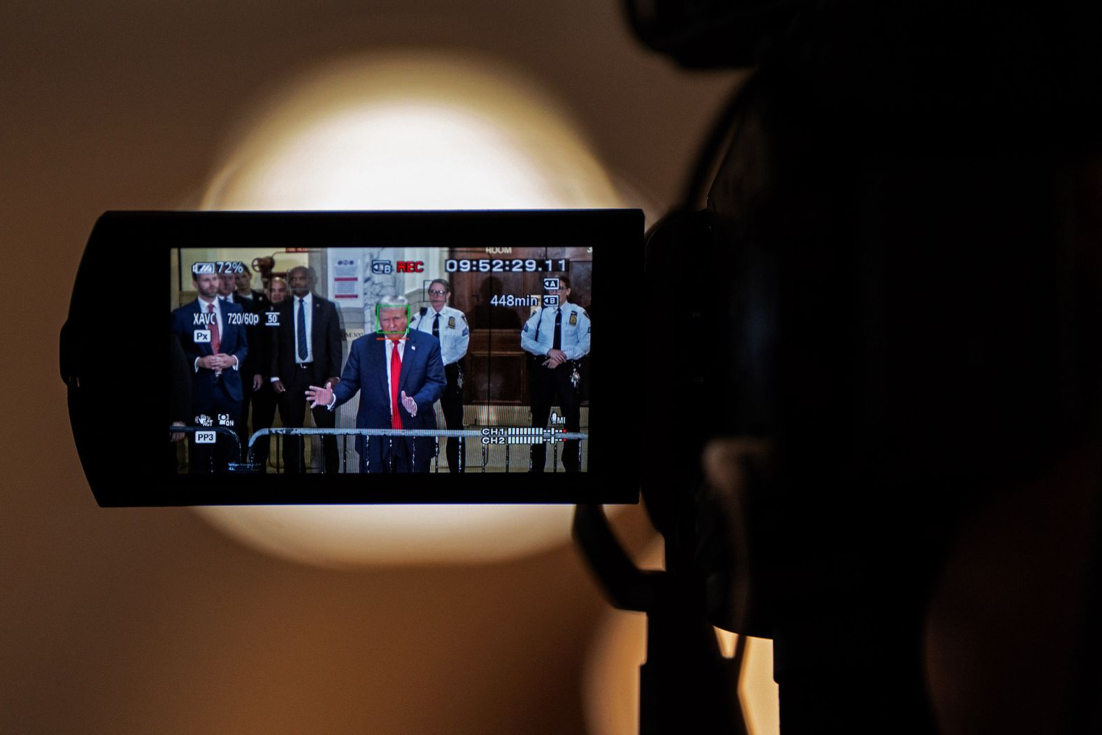 Donald Trump is seen on camera while speaking to the media on October 4.