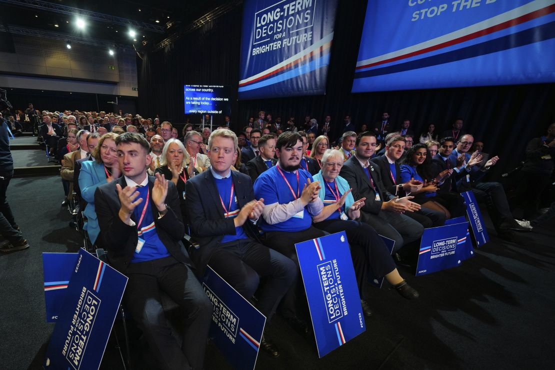 Supporters applaud as Britain's Prime Minister Rishi Sunak speaks during the Conservative Party annual conference on Wednesday.