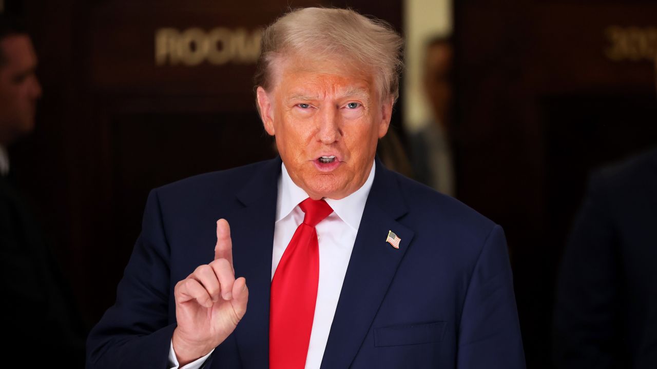 NEW YORK, NEW YORK - OCTOBER 03: Former President Donald Trump speaks as he leaves the courtroom for a lunch recess during the second day of his civil fraud trial at New York State Supreme Court on October 03, 2023 in New York City. Former President Trump may be forced to sell off his properties after Justice Arthur Engoron canceled his business certificates after ruling that he committed fraud for years while building his real estate empire after being sued by Attorney General Letitia James, who is seeking $250 million in damages. The trial will determine how much he and his companies will be penalized for the fraud. (Photo by Michael M. Santiago/Getty Images)