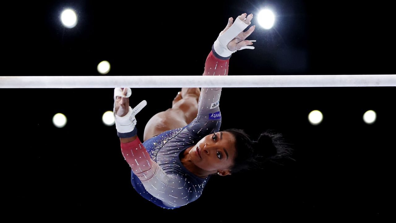 ANTWERP, BELGIUM - OCTOBER 04: Simone Biles of Team United States competes on the Uneven Bars during the Women's Team Final on Day Five of the 2023 Artistic Gymnastics World Championships on October 04, 2023 in Antwerp, Belgium. (Photo by Naomi Baker/Getty Images)
