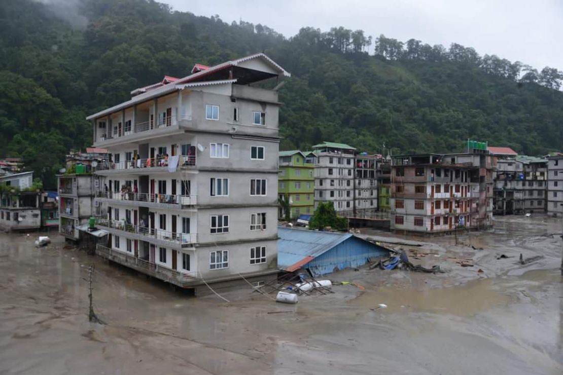 Buildings are inundated by flood waters in Rangpo town.