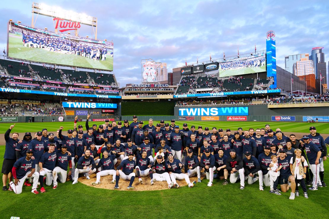 MINNEAPOLIS, MN - OCTOBER 04:  Members of the Minnesota Twins pose for a team photo on the field after the Twins defeated the Toronto Blue Jays in Game 2 of the Wild Card Series at Target Field on Wednesday, October 4, 2023 in Minneapolis, Minnesota. (Photo by Daniel Shirey/MLB Photos via Getty Images)