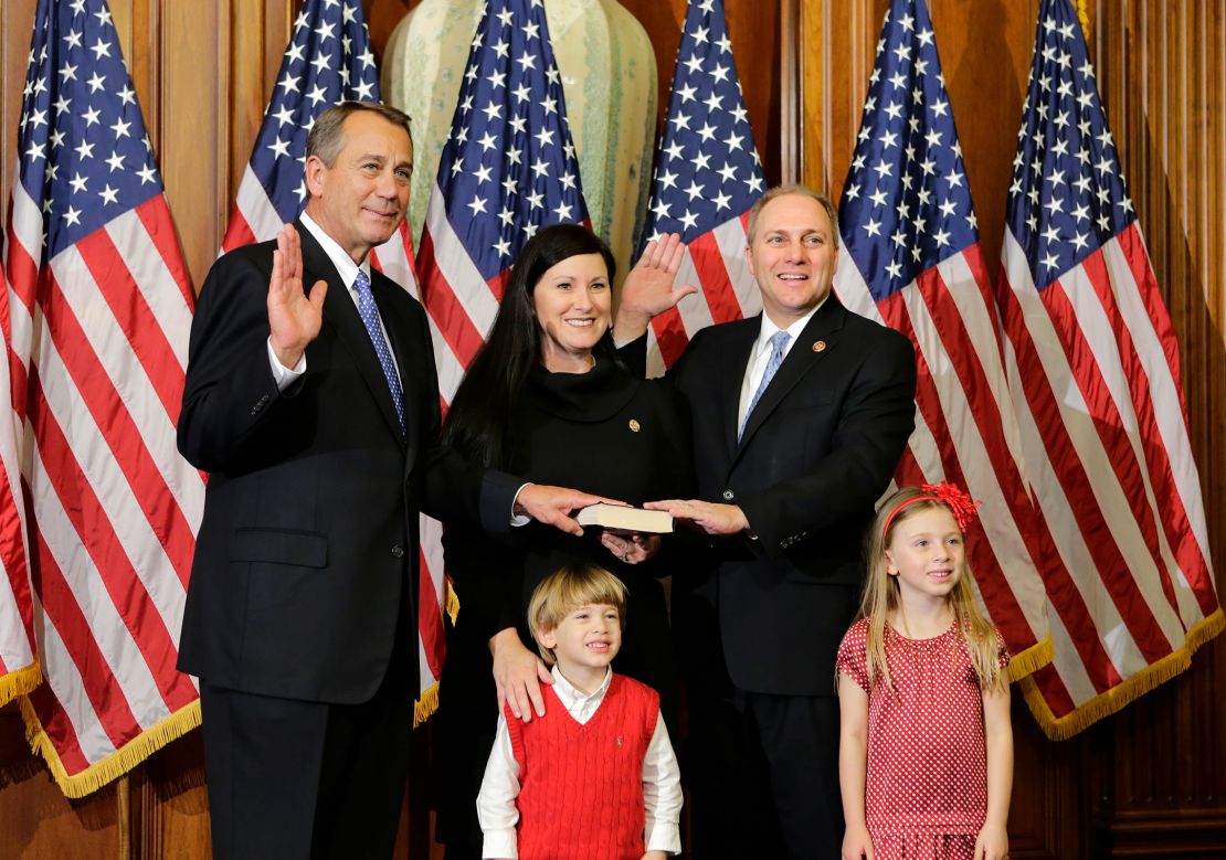 Rep. Steve Scalise stands with his family with Speaker of the House John Boehner in January 2013, in Washington. 