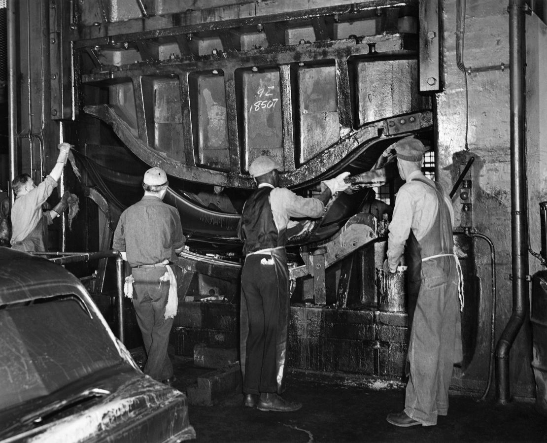 A 1946 photo  showing workers on a press forming in a Ford factory in Detroit. 
Black workers for decades were relegated to the lowest-paying jobs at auto factories, but fought to win greater access.