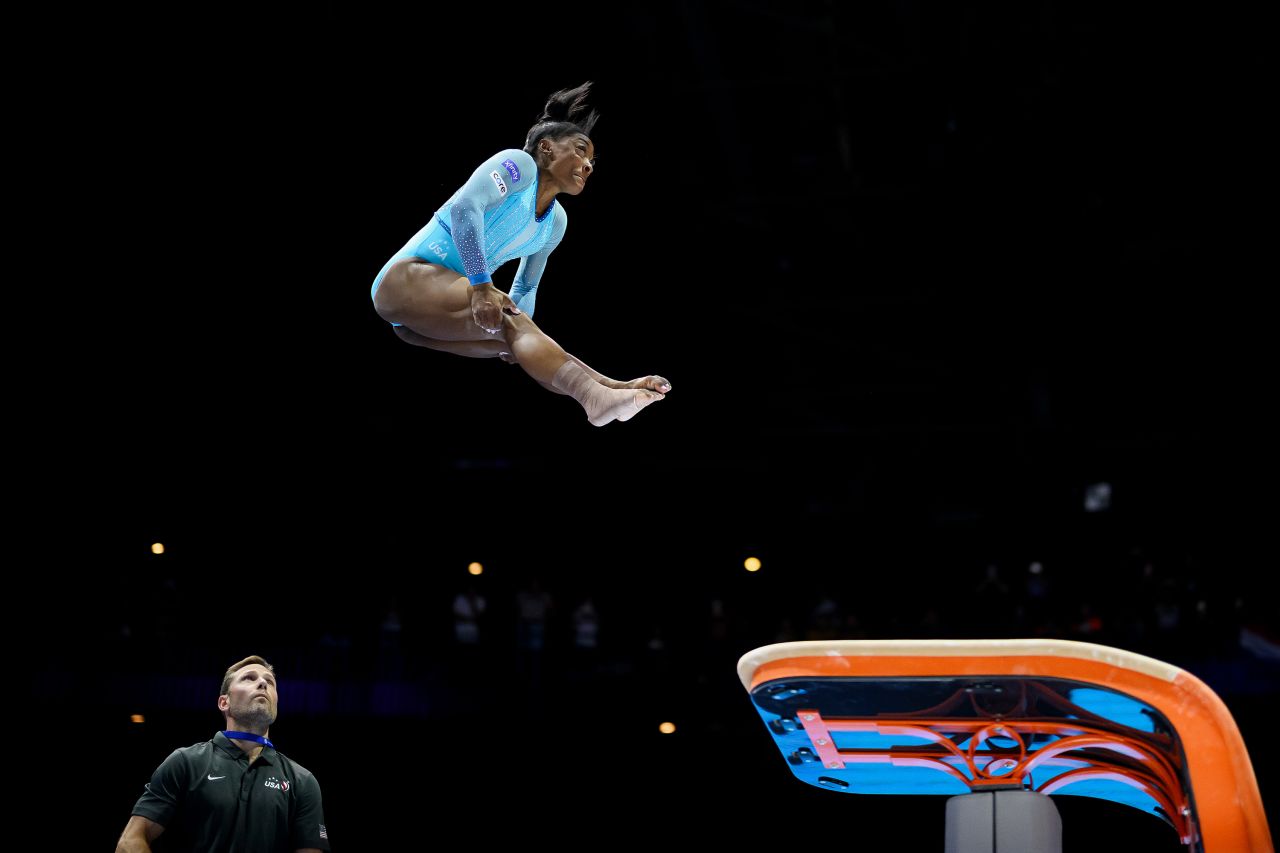 American gymnast <a href="http://www.cnn.com/2019/10/11/sport/gallery/simone-biles/index.html" target="_blank">Simone Biles</a> lands a Yurchenko double pike vault — a high-difficulty skill historically only done by men — while qualifying for the women's all-around competition at the World Artistic Gymnastics Championships on Sunday, October 1. It was <a href="https://www.cnn.com/2023/10/01/sport/simone-biles-world-gymnastics-championships-qualifying-spt-intl/index.html" target="_blank">the first time a woman landed the move in an international competition</a>.