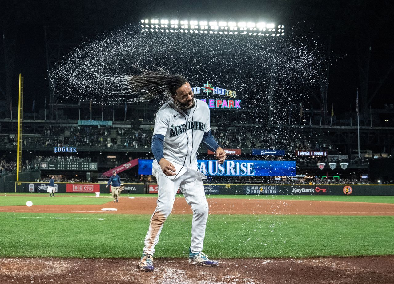 Seattle Mariners shortstop J.P. Crawford celebrates after he had a bucket of water dumped on him following a walk-off win against the Texas Rangers on Thursday, September 28.