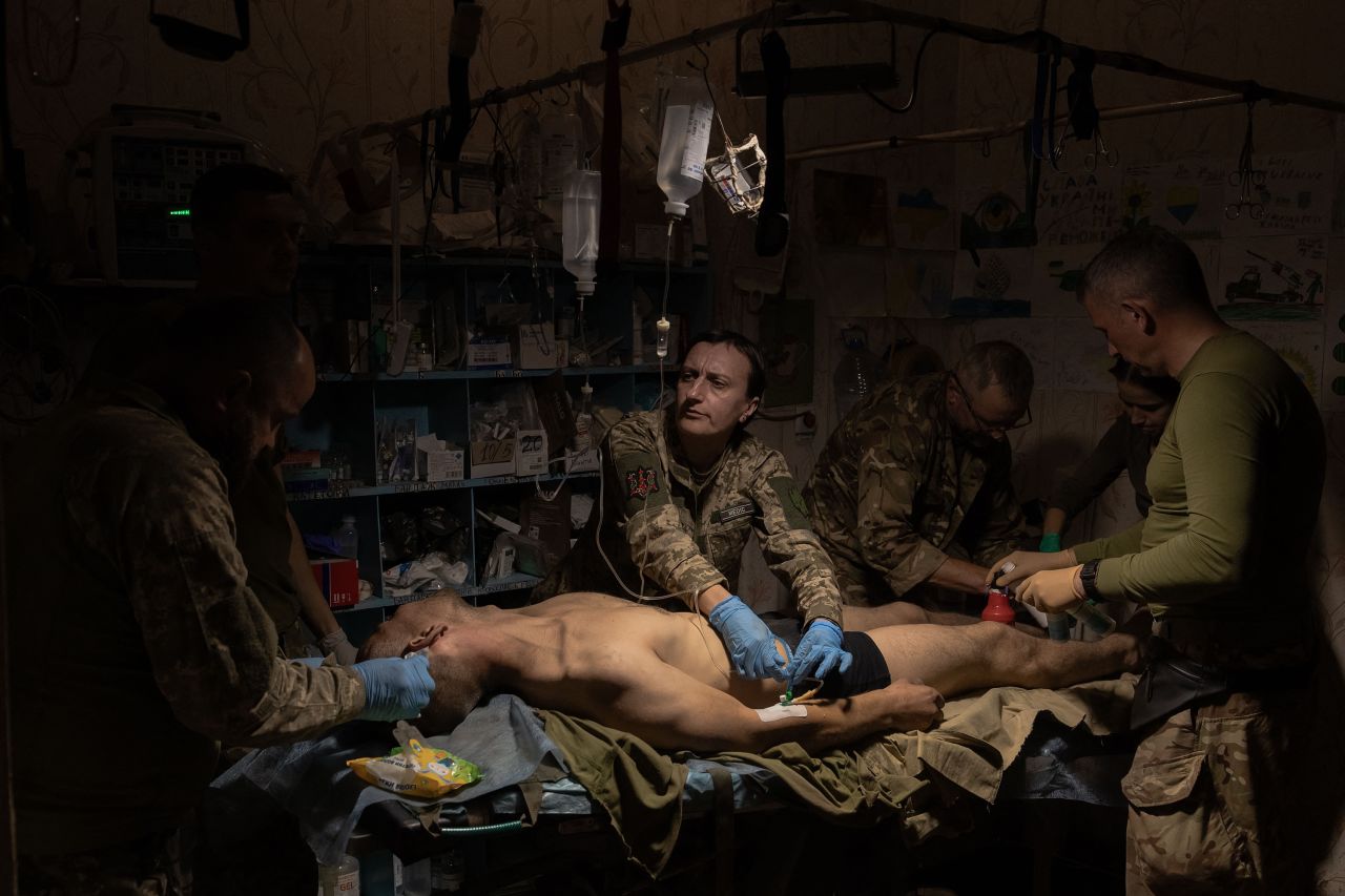 A wounded Ukrainian soldier is treated by medics near Bakhmut, Ukraine, close to the front lines of the fight against Russia, on Friday, September 29.