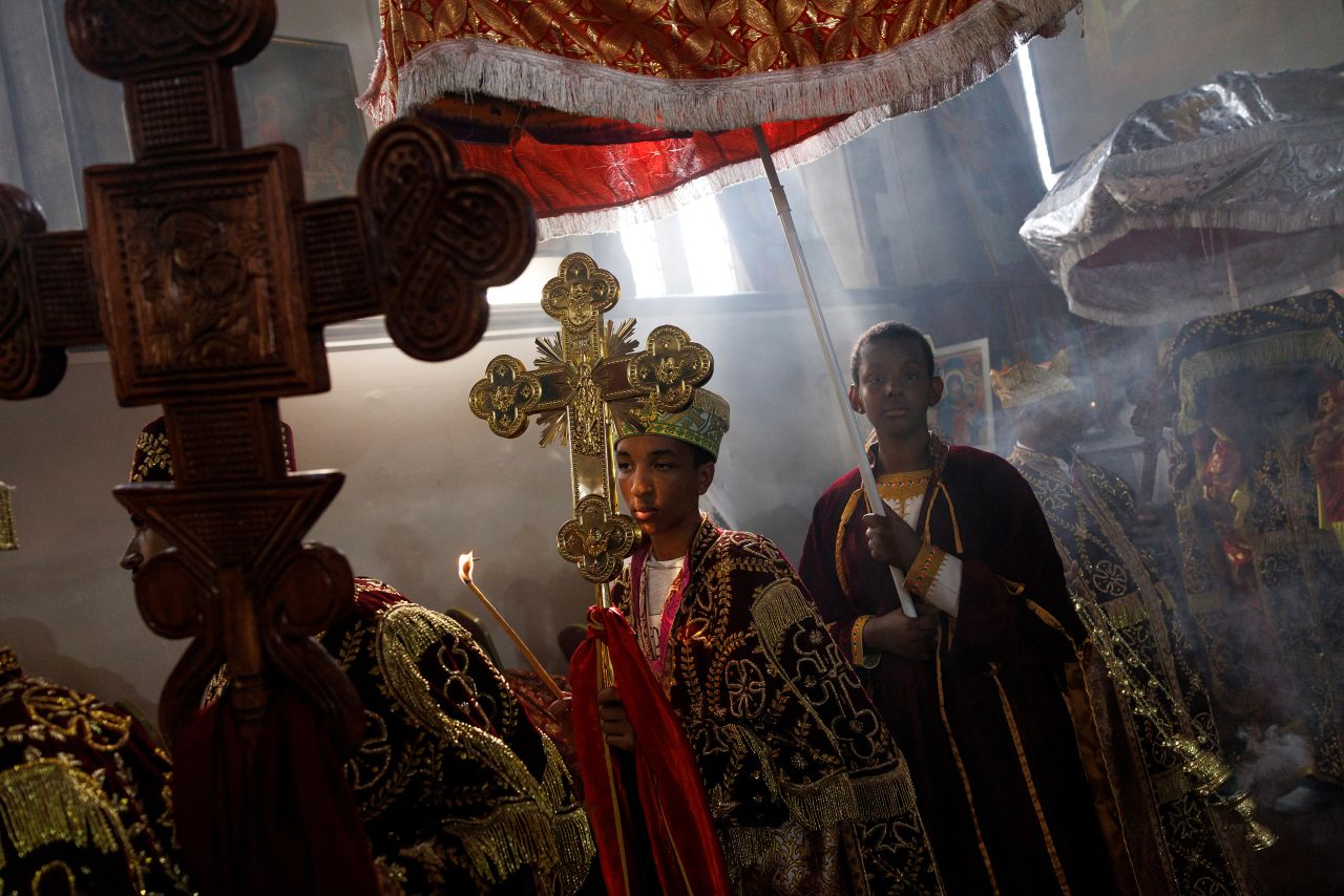 People take part in a joint celebration of Meskel and the restitution of a sacred Tabot at the Ethiopian Orthodox Church in London on Saturday, September 30.
