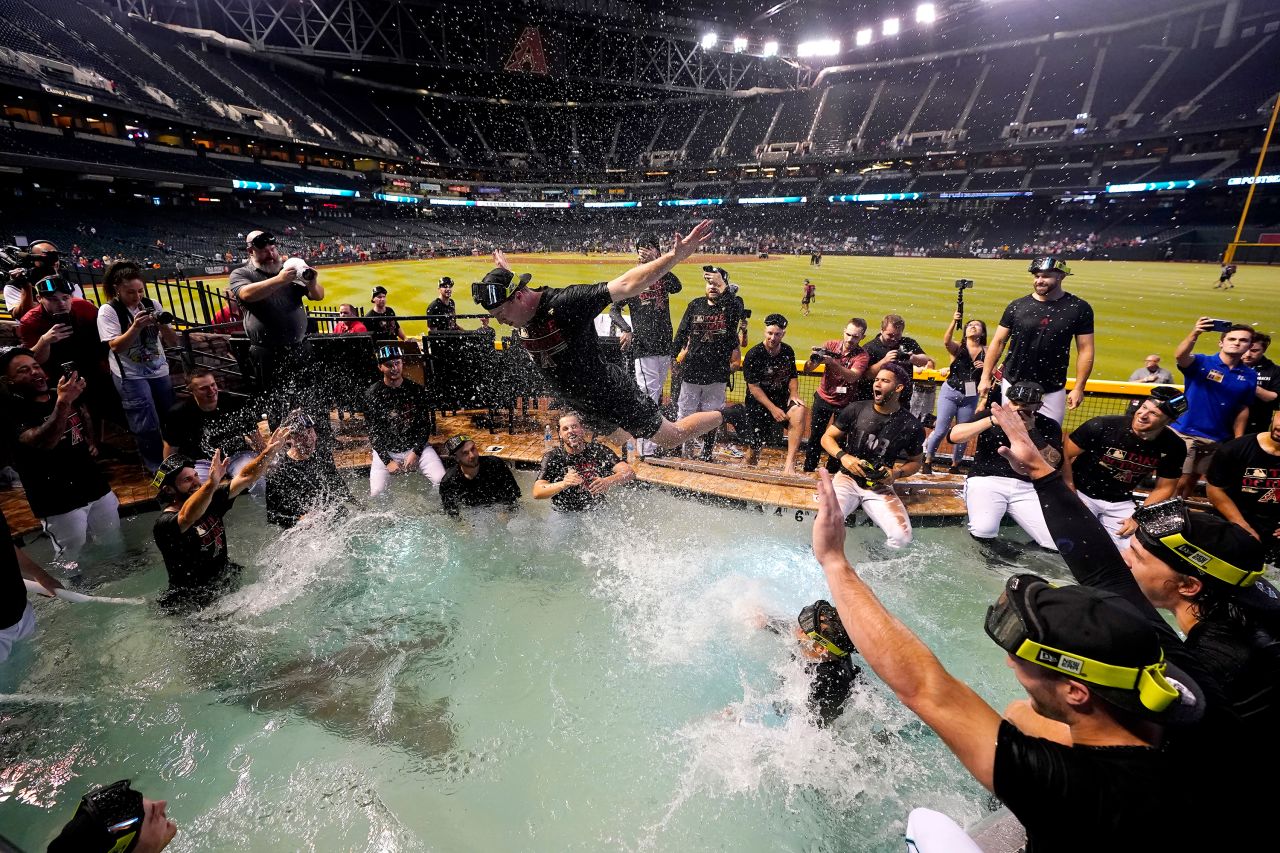 The Arizona Diamondbacks celebrate in a Chase Field swimming pool after clinching a spot in the Major League Baseball playoffs on Saturday, September 30.