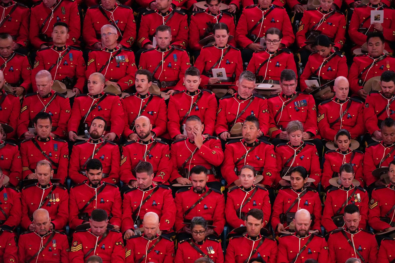 Officers with the Royal Canadian Mounted Police attend a funeral for Const. Rick O'Brien in Langley, British Columbia, on Wednesday, October 4. O'Brien was killed last month while executing a search warrant at a home in Coquitlam.
