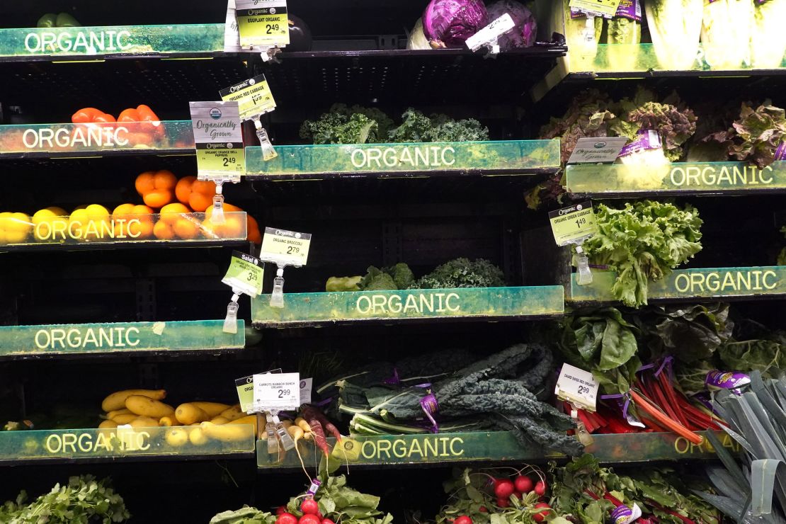 Fresh organic vegetable selection in produce aisle at grocery store  supermarket. Stock Photo