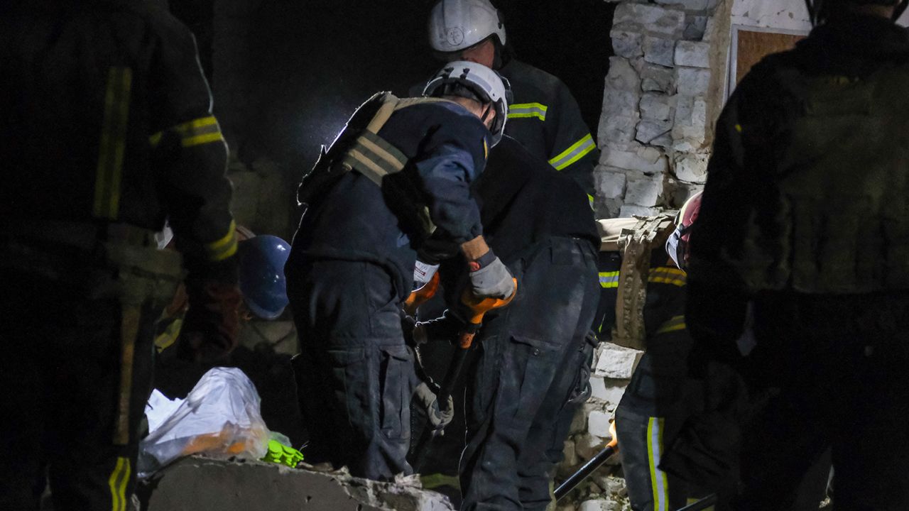 Ukraine's emergency services work through the night digging through the rubble in the aftermath of a Russian missile attack.