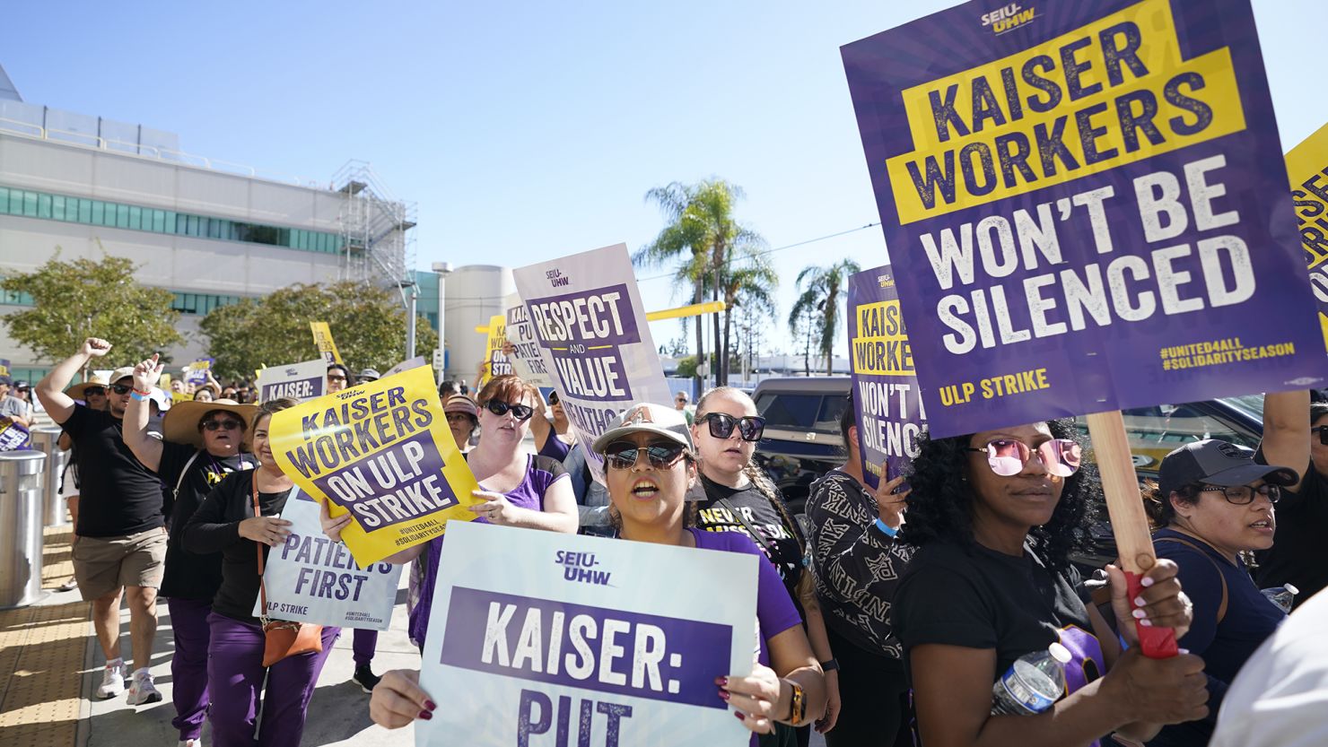 Kaiser Permanente workers picket in California on the second day of a three-day strike earlier this month. The union announced it had reached a tentative deal with Kaiser that could avert a second strike at the health care system. 