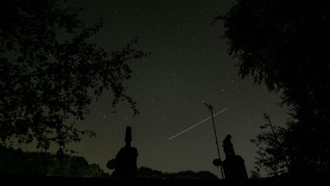 Mandatory Credit: Photo by Adam Vaughan/Shutterstock (10947036b)
A Draconid Meteor in the sky above West Yorkshire.
Draconids Meteor Shower, Huddersfield, UK - 08 Oct 2020