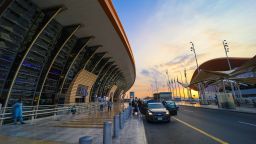 Jeddah , Saudi Arabia - Mar 11 2023 : Passengers traveling through King Abdulaziz International Airport - flight  and booking concept