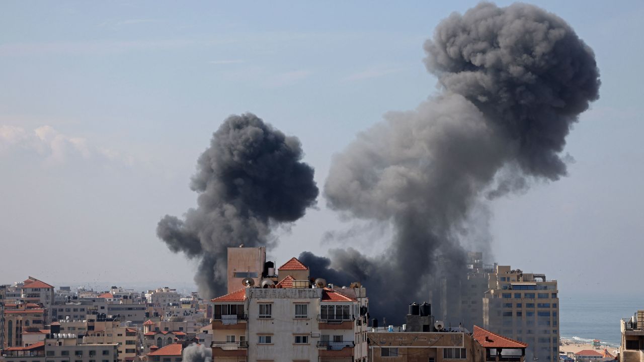 Smoke billows from a residential building following an Israeli airstrike in Gaza City on Saturday.