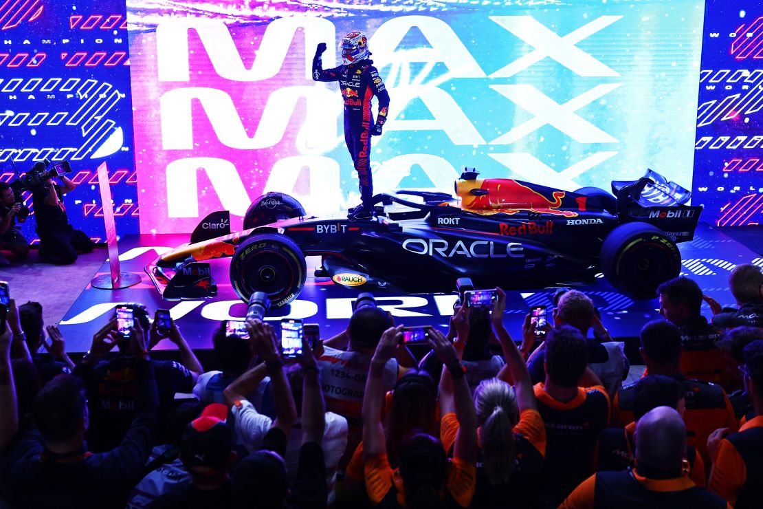 2023 F1 World Drivers Champion Max Verstappen of the Netherlands and Oracle Red Bull Racing celebrates on his car in parc ferme after the Sprint ahead of the F1 Grand Prix of Qatar at Lusail International Circuit on October 07, 2023 in Lusail City, Qatar.