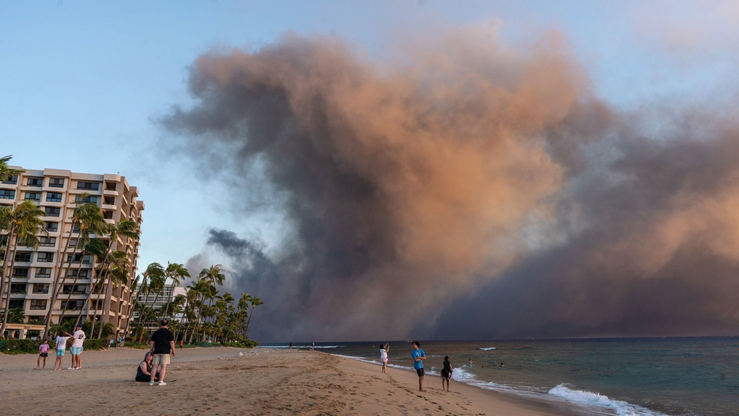 Wildfires burn over the town of Lahaina as seen in the neighboring Kaanapali Alii resort, on August 08, 2023, in Maui, Hawaii.