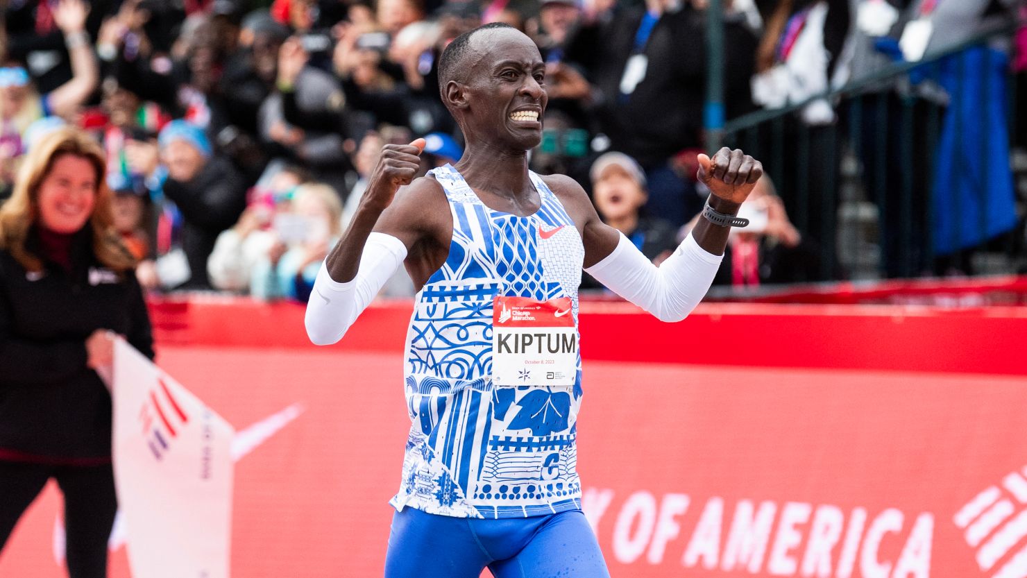 Oct 8, 2023; Chicago, IL, USA; Kelvin Kiptum (KEN) celebrates after finishing in a world record time of 2:00:35 to win the Chicago Marathon at Grant Park. Mandatory Credit: Patrick Gorski-USA TODAY Sports
