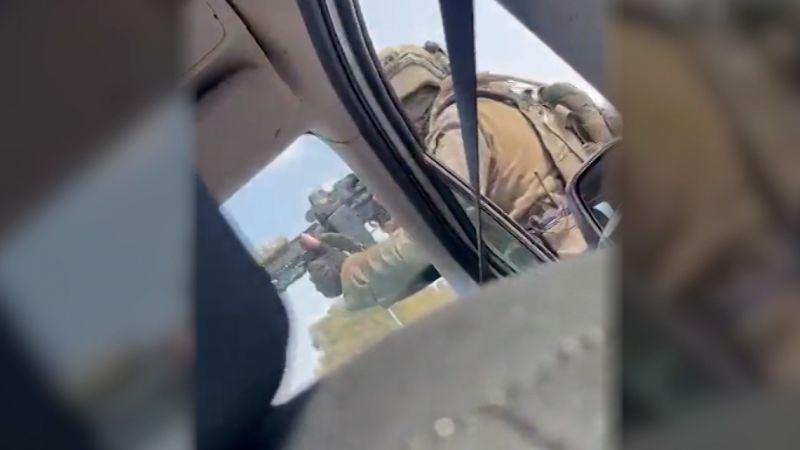 shows guns fired in the middle of a highway in Israel