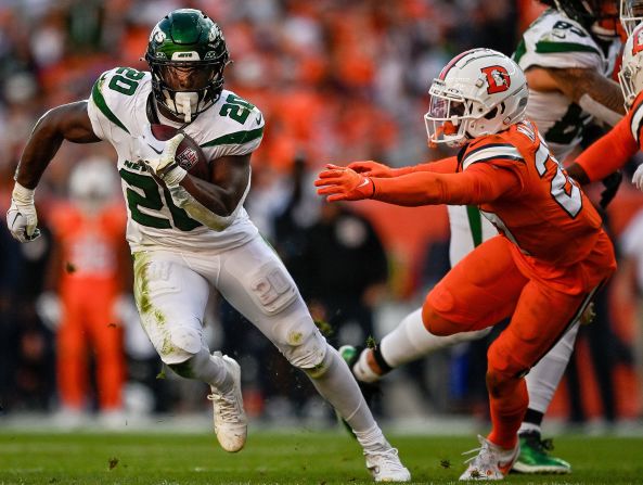 New York Jets running back Breece Hall carries the ball during a game against the Denver Broncos on October 8. The Jets won 31-21.