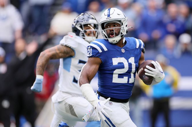 Indianapolis Colts running back Zack Moss runs the ball for a touchdown during the first quarter against the Tennessee Titans at Lucas Oil Stadium on October 8. The Colts beat the Titans 23-16.