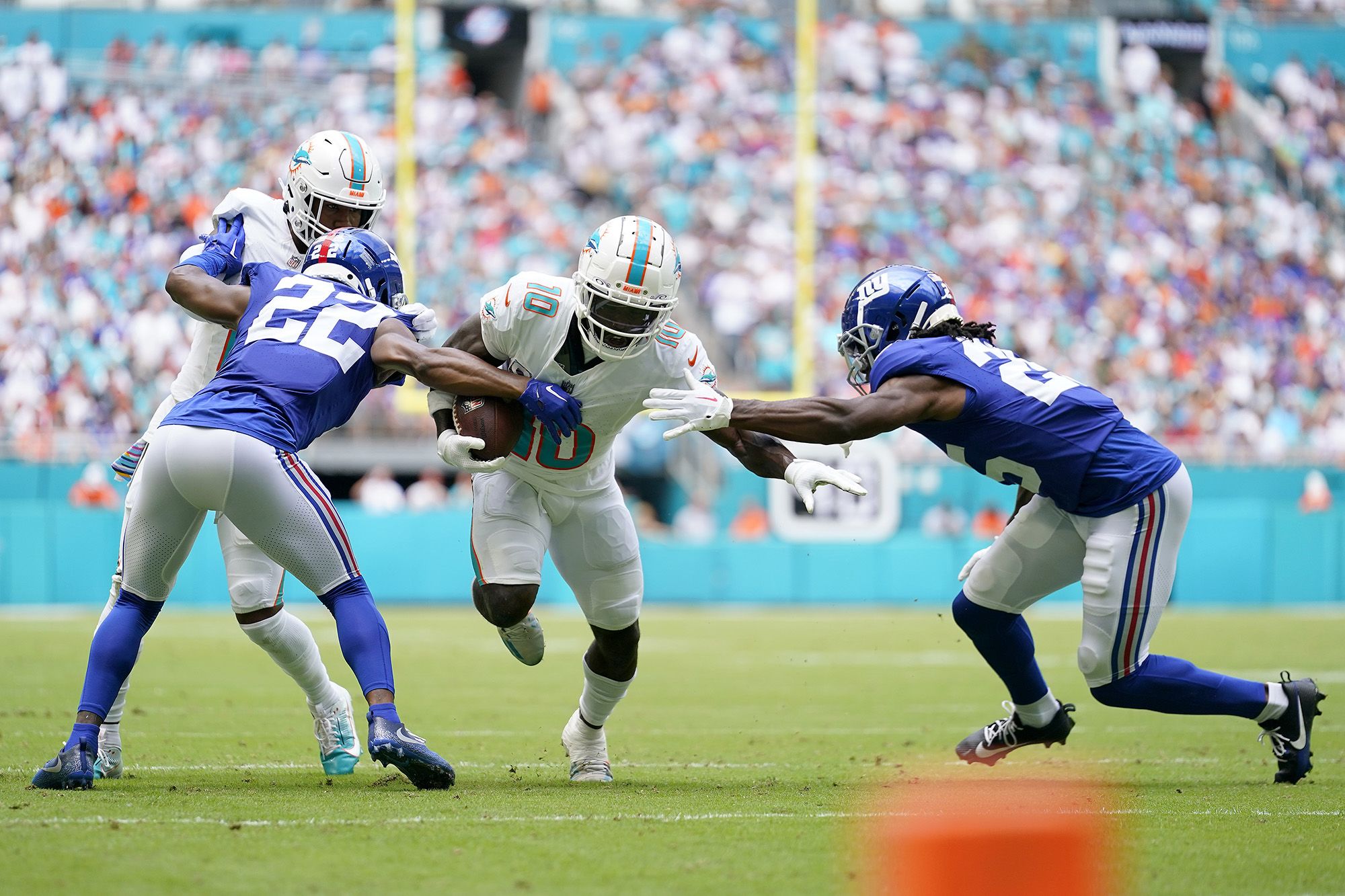 Jordan Mason of the San Francisco 49ers runs the ball during the News  Photo - Getty Images