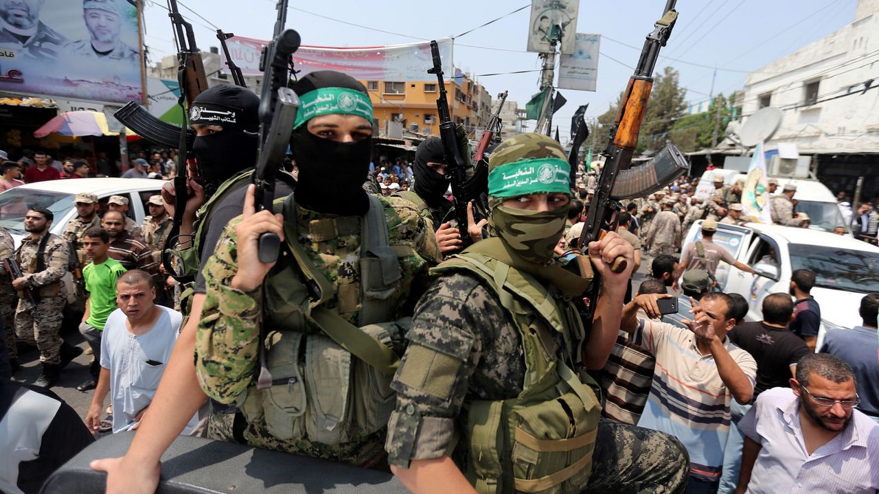 Palestinian Hamas militants attend the funeral of their comrade in the southern Gaza Strip in August 2017.
