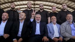 26 June 2022, Lebanon, Sidon: Ismail Haniyeh (C), Chairman of the Political Bureau of Palestinian organization Hamas, flashes the victory sign while being flanked by bodyguards and senior Palestinian officials during a rally at the southern Lebanese port city of Sidon. Haniyeh arrived in Lebanon and met with Lebanese officials including Hassan Nasrallah, Secretary General of the pro-Iran Hezbollah group. Photo: Marwan Naamani/dpa (Photo by Marwan Naamani/picture alliance via Getty Images)