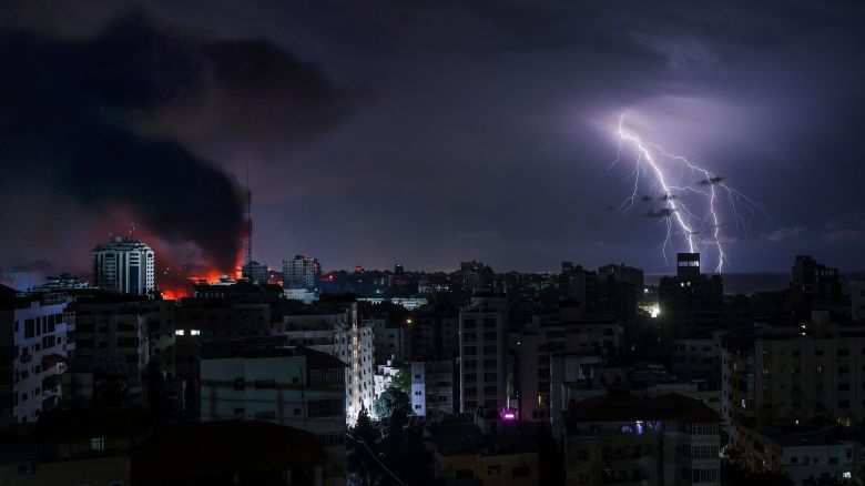 Lightning strikes over Gaza City following an Israeli bombardment on October 9.