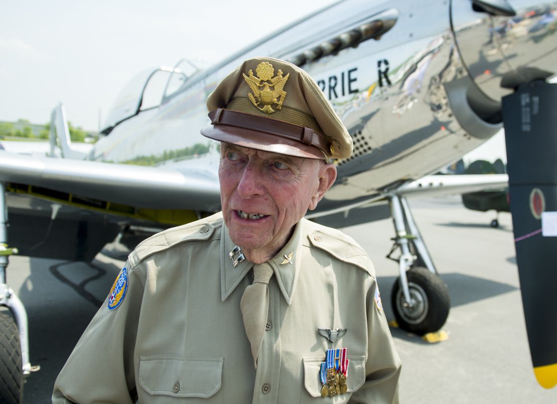 World War II veteran Jerry Yellin, a former P51 fighter pilot, stands in front of a P51 airplane as dozens of World War II era aircraft gather at Culpeper Regional Airport in Brandy Station, Virginia, May 7, 2015. The planes will fly past the National Mall in Washington, DC, on May 8, during the Arsenal of Democracy World War II Victory Capitol Flyover to commemorate the 70th anniversary of Victory in Europe (VE) Day. Yellin flew in the last combat mission over Japan. AFP PHOTO / SAUL LOEB (Photo credit should read SAUL LOEB/AFP via Getty Images)