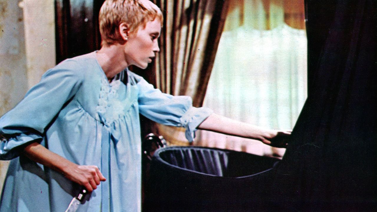 Mia Farrow clutches a knife in a scene from the film 'Rosemary's Baby', 1968.