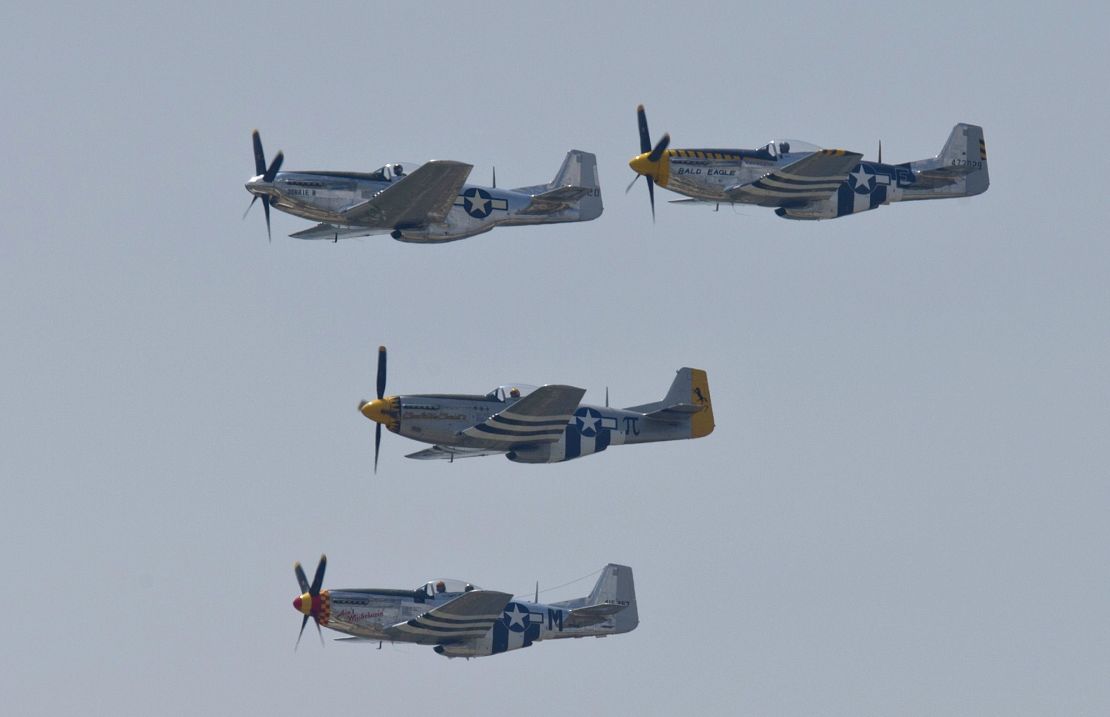 North American P-51 Mustangs fly over the National Mall during the Arsenal of Democracy, a WWII plane flyover for the 70th anniversary of V-E Day in Washington, DC, on May 8 2015. AFP PHOTO/ ANDREW CABALLERO-REYNOLDS        (Photo credit should read Andrew Caballero-Reynolds/AFP via Getty Images)