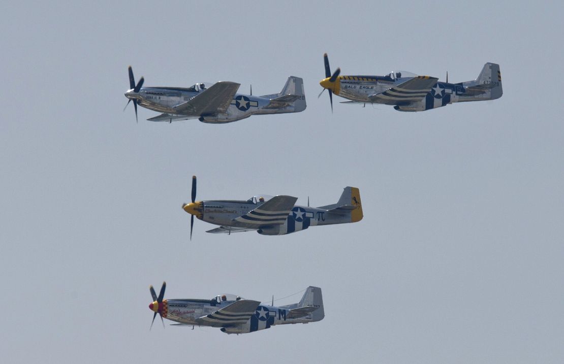 North American P-51 Mustangs fly over the National Mall during the Arsenal of Democracy, a WWII plane flyover for the 70th anniversary of V-E Day in Washington, DC, on May 8 2015. AFP PHOTO/ ANDREW CABALLERO-REYNOLDS (Photo credit should read Andrew Caballero-Reynolds/AFP via Getty Images)