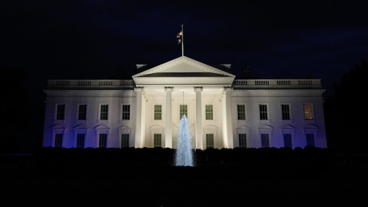 The White House is illuminated in white and blue in support of Israel on October 9, 2023.