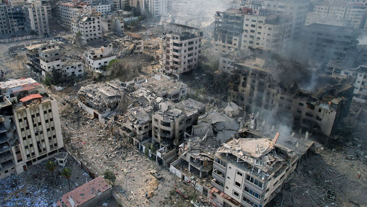 TOPSHOT - This aerial photo show heavily damaged buildings following Israeli airstrikes in Gaza City on October 10, 2023. Israel pounded Hamas targets in Gaza on October 10 and said the bodies of 1,500 Islamist militants were found in southern towns recaptured by the army in gruelling battles near the Palestinian enclave. (Photo by BELAL AL SABBAGH / AFP) (Photo by BELAL AL SABBAGH/AFP via Getty Images)