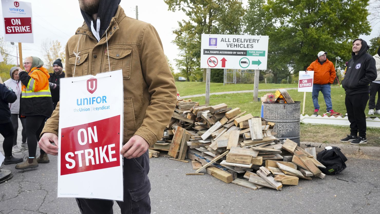 Unifor workers strike outside the General Motors St. Catharines powertrain plant in St. Catharines, Ontario. The strike by Unifor lasted less than a day, and a ratification vote Sunday averted the chance the strike would be resumed.