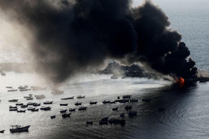 Smoke rises after Israeli strikes on the seaport of Gaza City on Tuesday, October 10.